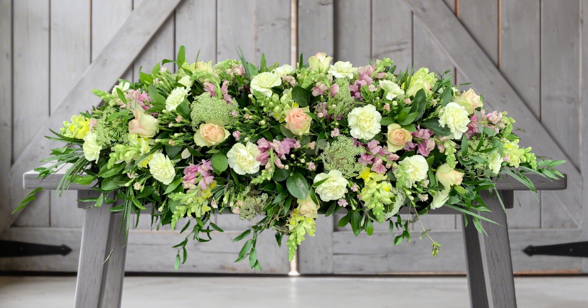 Bespoke funeral flower arrangement by Beloved Flowers, funeral florist in Oxted and Kent