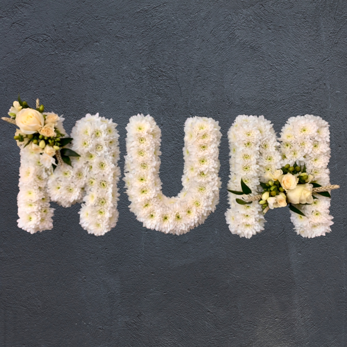 White rose floral name letter tribute by Beloved Flowers, funeral florist in Kent